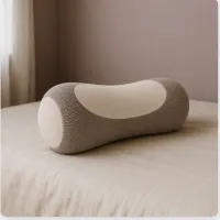 HuskRest buckwheat pillow on a made bed